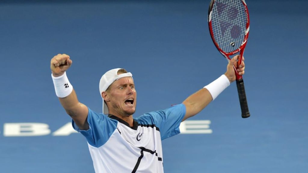 Lleyton Hewitt of Australia celebrates victory after winning his Mens finals match against Roger Federer of Switzerland during day eight of the 2014 Brisbane International at Queensland Tennis Centre in Brisbane, Australia. (Photo by Bradley Kanaris/Getty Images)