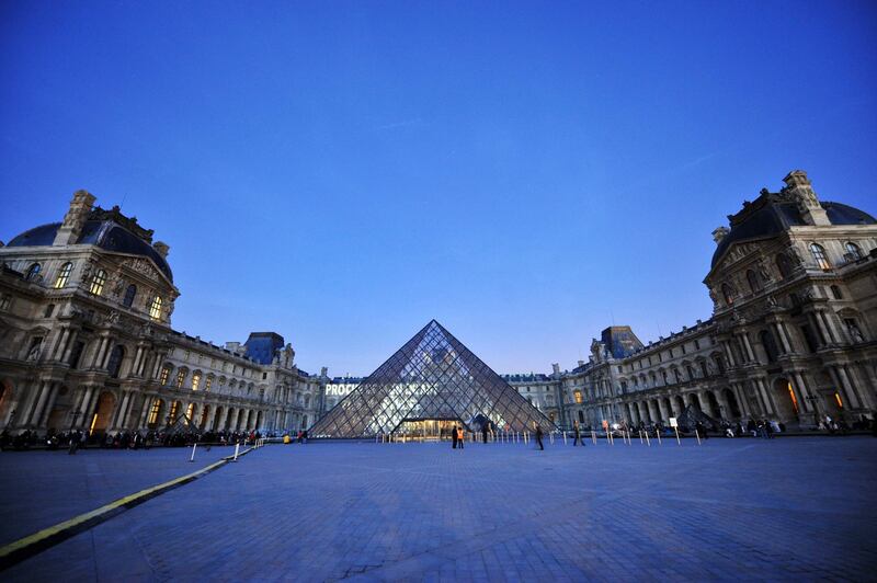IM Pei’s pyramid at the Louvre Museum, in Paris. Photograph: Lionel Bonaventure/AFP/Getty