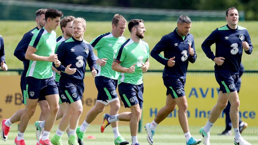 John O’Shea leads the run during the Republic of Ireland training session at the FAI National Training Centre on Friday. Photograph: Tommy Dickson/Inpho