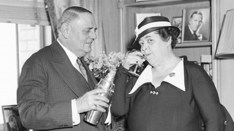 Oscar of the Waldorf: Oscar Tschirky, the hotel’s maitre d’ – here trying out a new cocktail on a guest in 1934 – is said to have refined eggs Benedict before adding the dish to the Waldorf menu. Photograph: Bettmann/Getty