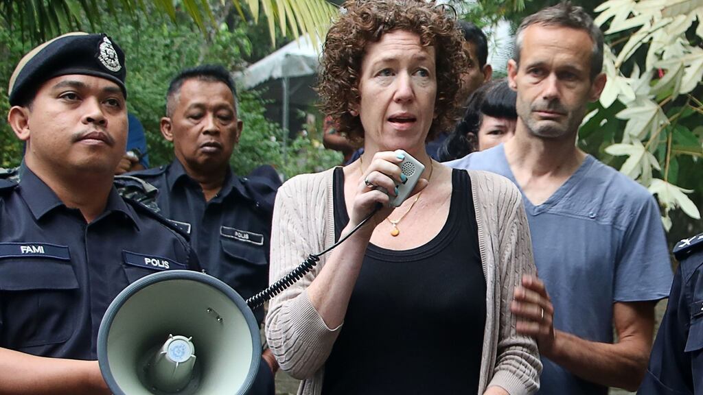 Meabh and Sebastien, parents of missing 15-year-old teenager Nóra Quoirin, with the police. Photograph: AFP/Getty Images