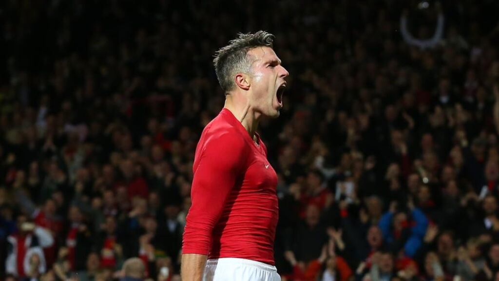 Manchester United’s Robin van Persie celebrates scoring his side’s late equaliser against Chelsea at Old Trafford. Photograph: Getty Images