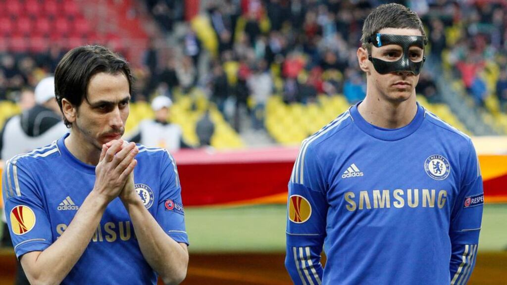 Fernando Torres and Yossi Benayoun look on during the UEFA Europa League quarter final second leg match between FC Rubin Kazan and Chelsea at the Luzhniki Stadium. Photograph: Photograph: Dmitry Korotayev/Epsilon/Getty Images