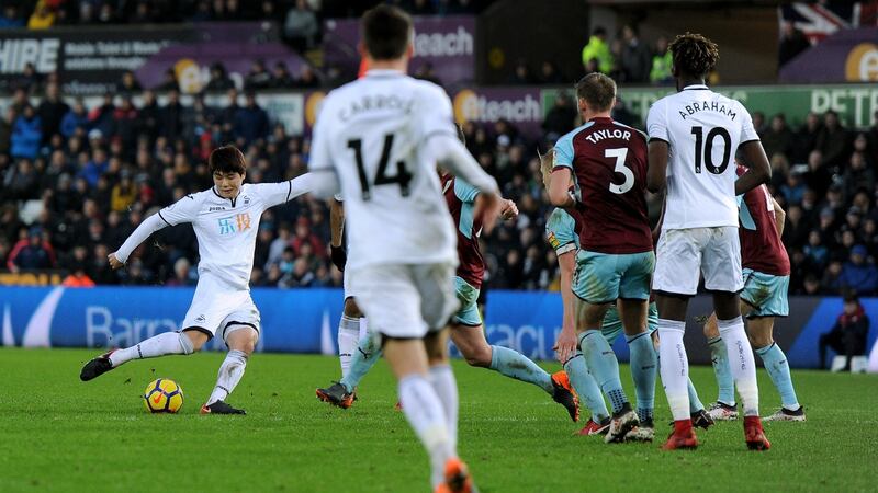 Ki Sung-Yueng of Swansea City scores his side’s first goal during their win over Burnley. Photo: Harry Trump/Getty Images