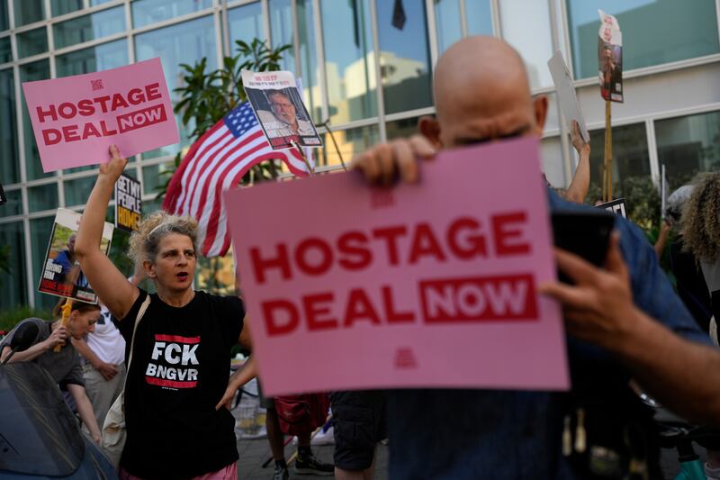 Israelis protest near the hotel where US secretary of state Antony Blinken is staying in Tel Aviv. Photograph: Ohad Zwigenberg/AP