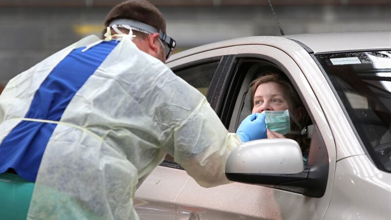 HSE staff and volunteers from NUI Galway College of Medicine, Nursing and Health Sciences at Galway Airport Community Testing Centre simulating COVID-19 testing on staff members, before the centre opened for testing on Wednesday. Photograph: Joe O’Shaughnessy.