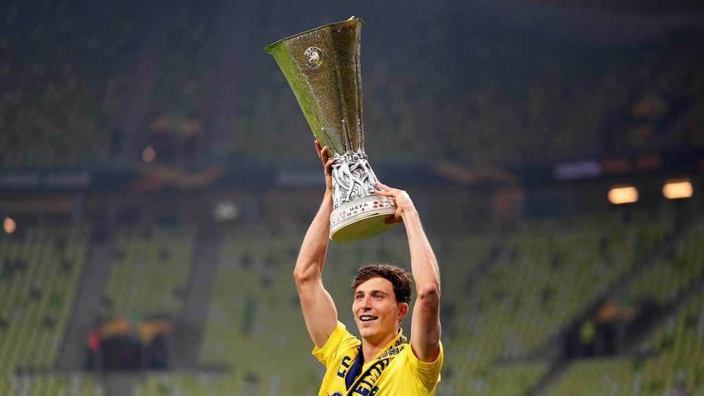 Pau Torres of Villarreal celebrates with the trophy after winning the Europa League. Photo: Michael Sohn/EPA