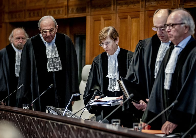 President Joan Donoghue and other judges in the International Court of Justice take their seats prior to the hearing on the genocide case against Israel, brought by South Africa, in The Hague. Photograph: Remko de Waal/ANP/AFP via Getty Images