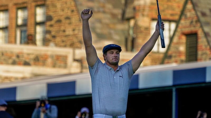 Bryson DeChambeau celebrates after sinking the winning putt at Winged Foot. Photograph: Charles Krupa/AP