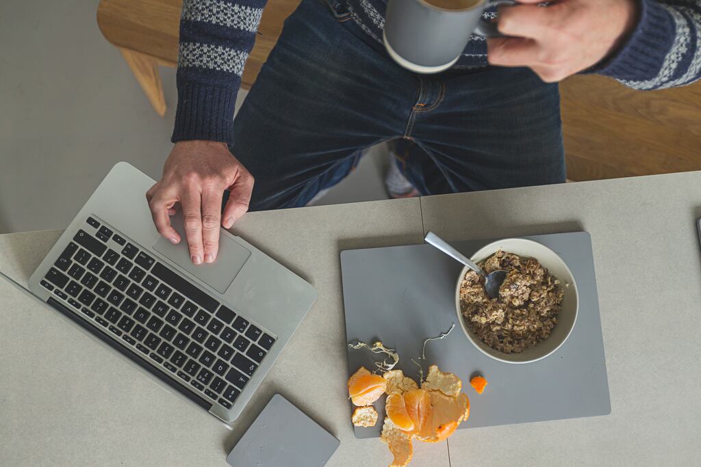 Working from home and drinking coffee , getty images