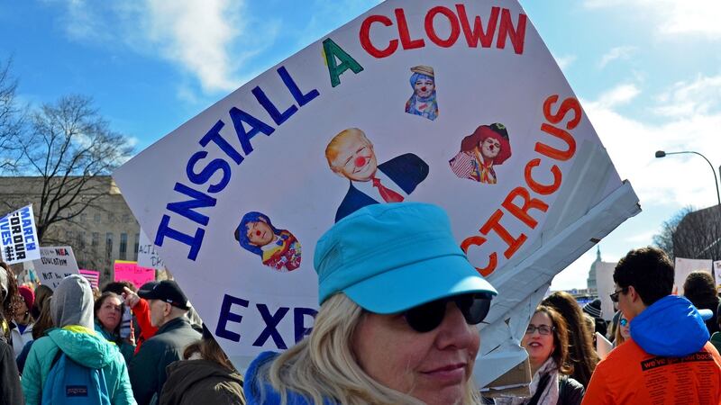 A woman holds aloft a sign at the March for Our Lives rally in Washington, DC on Saturday. Photograph: Eva Hambach/AFP/Getty Images