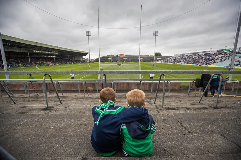 Two young Limerick fans watch their team take on Tipperary at the Gaelic Grounds. Funding intercounty teams has become an increasingly competitive exercise, one in which no one wants to be the first to fold. Photograph: Tommy Dickson/Inpho