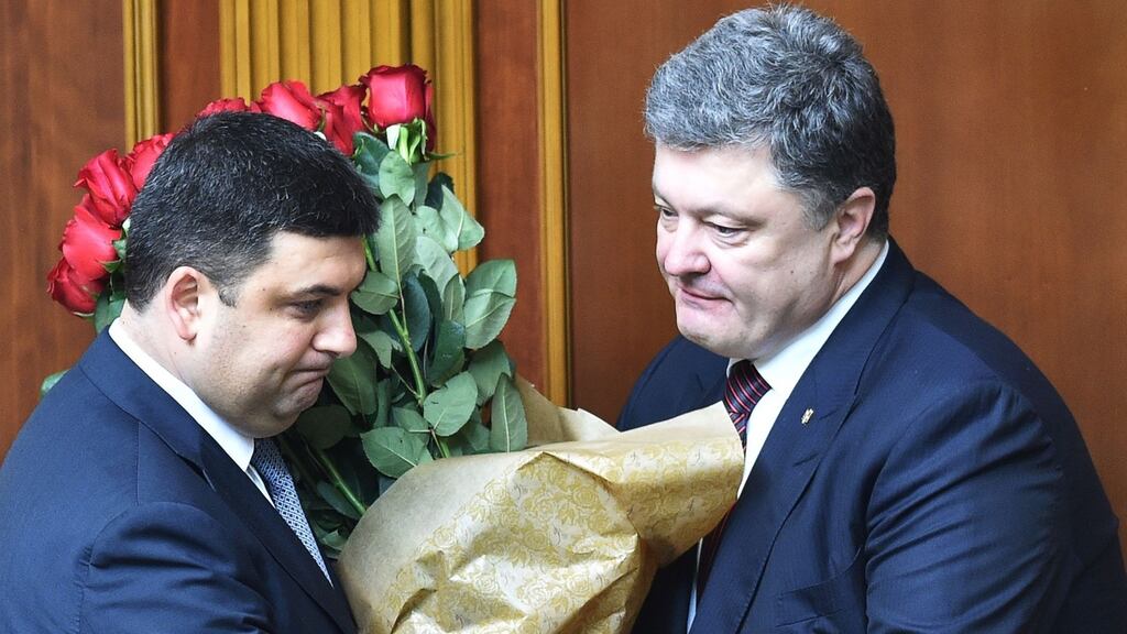 Ukraine’s newly appointed prime minister, Volodymyr Groysman (left), is greeted by President Petro Poroshenko at the parliament in Kiev on Thursday, after months of political gridlock. Photograph: Genya Savilov/AFP/Getty images