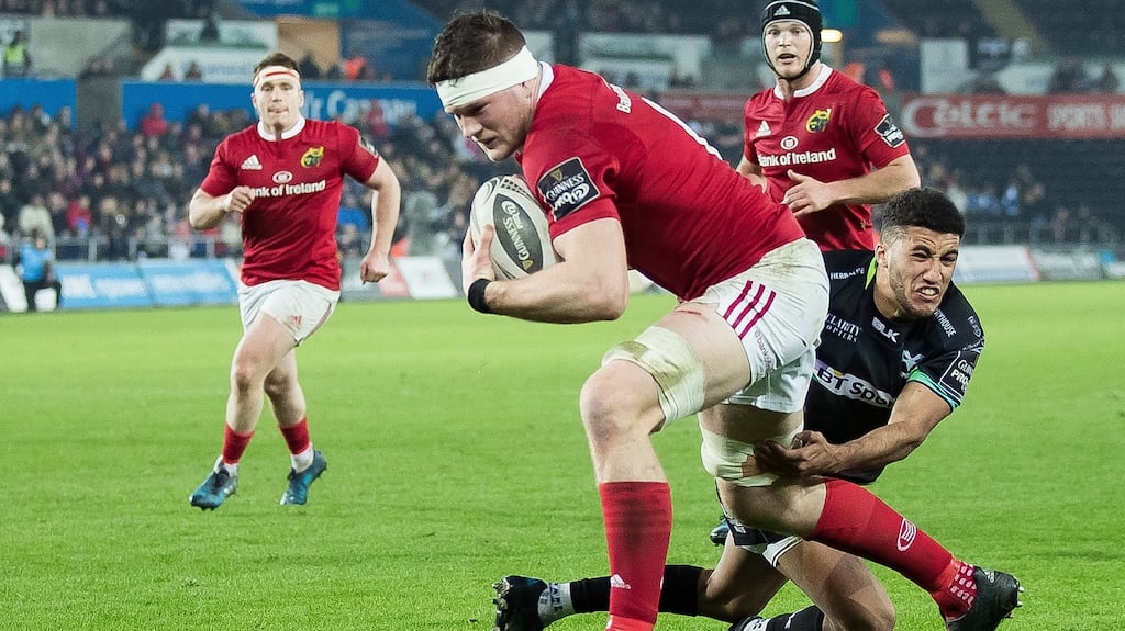 Munster number eight Jack O’Donoghue scores his side’s first try in the Guinness Pro 12 game against Ospreys at the Liberty Stadium in Swansea. Photograph: Simon King/Inpho/Camerasport