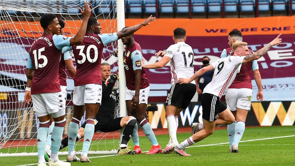 Aston Villa’s goalkeeper Orjan Nyland appears to carry the ball over the line but the goal was not given during their Premier League clash with Sheffield United. Photo: Paul Ellis/NMC/AFP POOL
