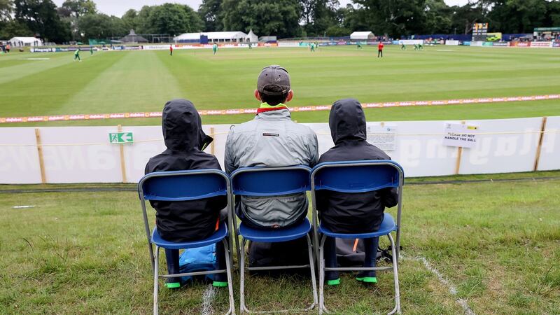 Spectators watching the game at Malahide. Photograph: Bryan Keane/Inpho