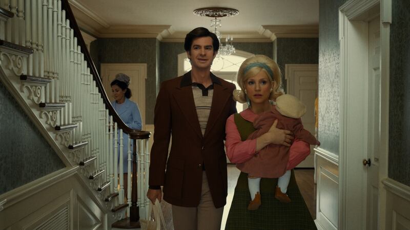 Andrew Garfield as Jim Bakker and Jessica Chastain as Tammy Faye in the film The Eyes of Tammy Faye. Photograph: Searchlight Pictures; 20th Century Studios