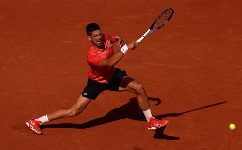 Novak Djokovic in action against Karen Khachanov during the men's singles quarter-final at the French Open at Roland Garros. Photograph: Julian Finney/Getty Images