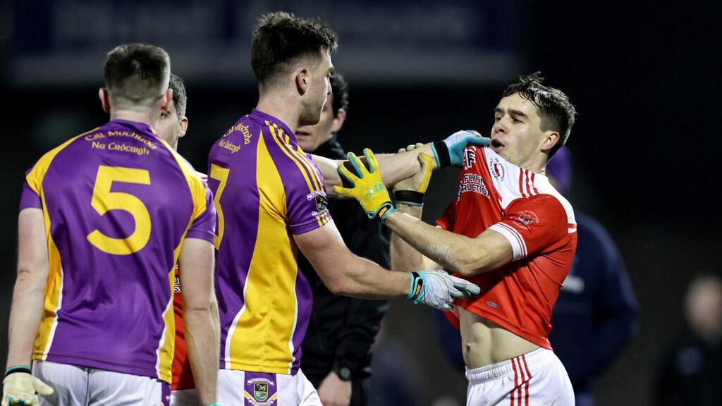 Tempers flare between Padraig Pearses’ David Murray and Kilmacud Crokes’ Andrew McGowan. Photograph: Laszlo Geczo/Inpho