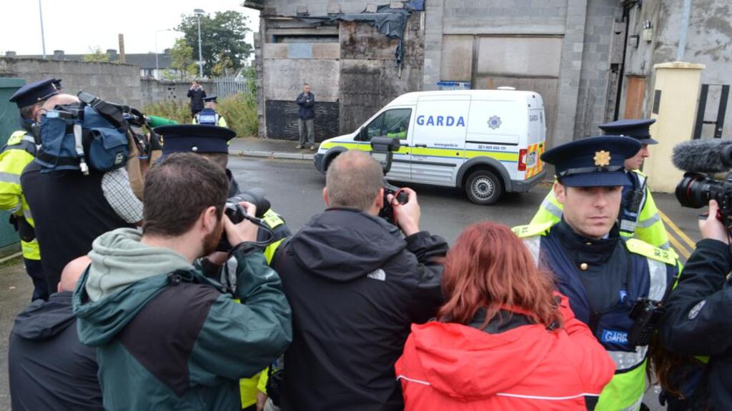 The scene outside Longford Court House early last month as a man was driven away after being charged with the rape of two young girls in Athlone. Photograph: Cyril Byrne/The Irish Times
