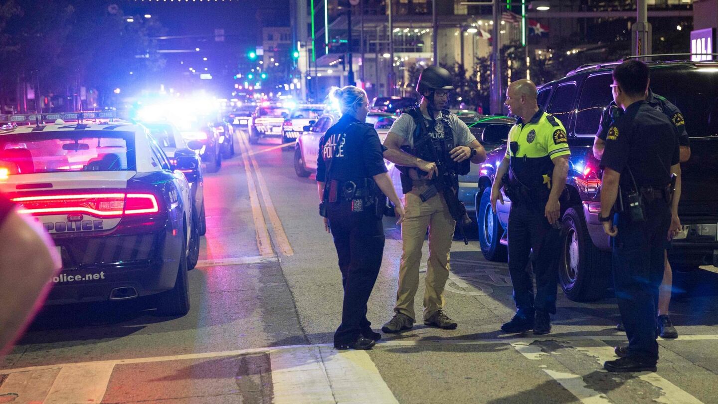 Police stand near a barricade following the sniper shooting in Dallas on Thursday, July 7th, 2016. Photograph: Laura Buckman/Getty Images