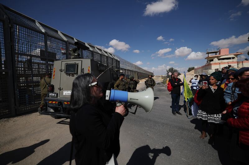 Israeli protesters block the gate at the Nitzana border crossing between Israel and Egypt, in southern Israel, on Wednesday to prevent humanitarian aid from reaching the Gaza Strip. Photograph: Atef Safadi/EPA