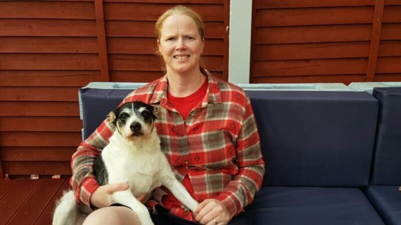 Deirdre Damasceno Wall with her dog Maggie, who has epilepsy
