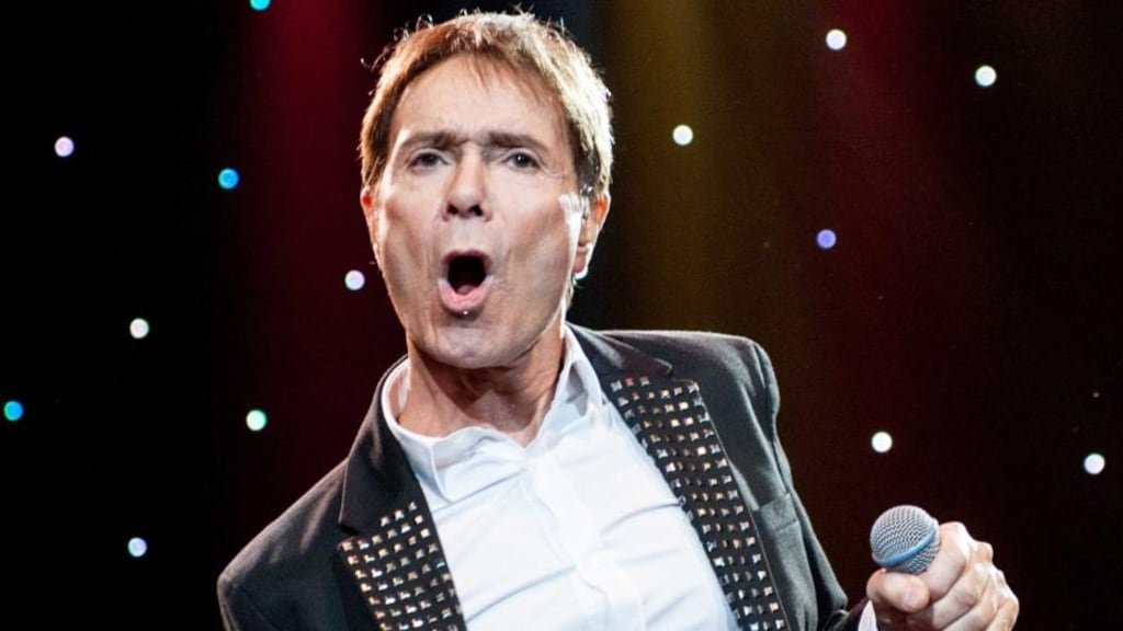 British singer Cliff Richard performing on stage in Amsterdam, Netherlands. The BBC and police have faced questions today about the reporting of a raid on his home in connection with an alleged historic sexual offence. Photograph: Ferdy Damman/EPA.