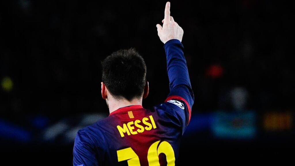 Lionel Messi celebrates after scoring his team's second goal during the UEFA Champions League round of 16 second leg match against AC Milan. Photograph: David Ramos/Getty Images