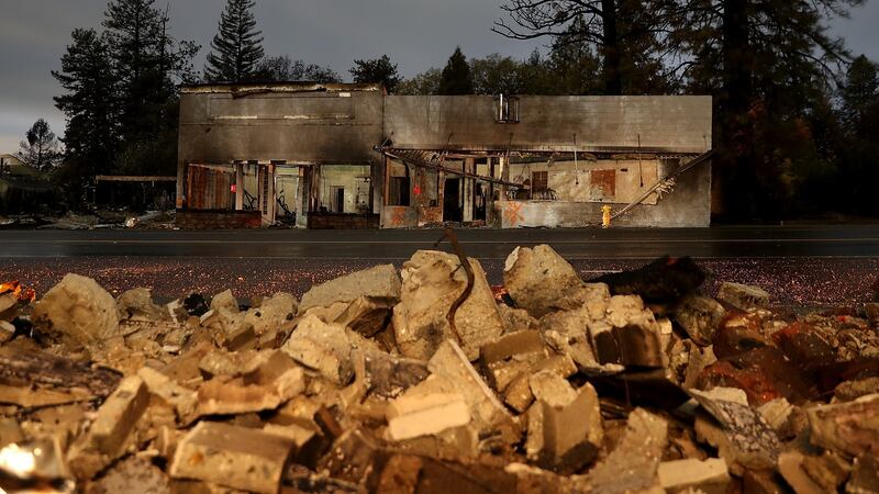 Fueled by high winds and low humidity the Camp Fire ripped through the town of Paradise on Tuesday charring over 150,000 acres, killed at least 83 people and has destroyed over 18,000 homes and businesses. Photograph: Justin Sullivan/Getty Images