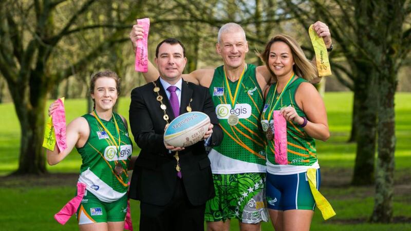 Paul Clinch, Men's over 50s Irish tag rugby team, with Ellen O’Sullivan and Lesley Walsh, members of the Women’s Irish tag rugby team, and Cllr James Collins, the former mayor of Limerick City and County. '“I would have loved the cap at the time,” says Clinch. “But I’m delighted to get one now.'
Photograph: Oisín McHugh/True Media