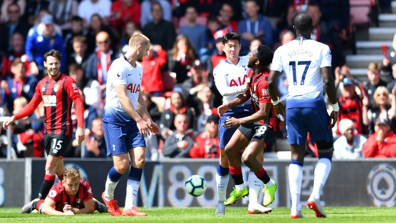 Tottenham’s Son Heung-Min was shown a straight red card for a push on Jefferson Lerma. Photograph: Dylan Martinez/Reuters