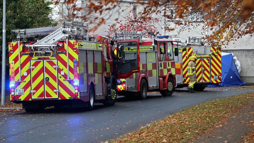 /19/11'19 The body is removed from   the scene, with the help of cutting equipment from Dublin Fire Brigade on Mount Andrew Court, Lucan this afternoon where the body of a man was discovered in a burning car last night...Picture Colin Keegan, Collins Dublin