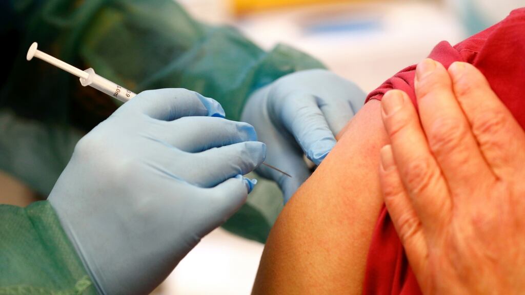 A health worker receives his vaccination shot of Pfizer-BioNTech Covid-19 vaccine at a hospital, in Ventspils, Latvia, on Monday. Photograph: Toms Kalnins/EPA