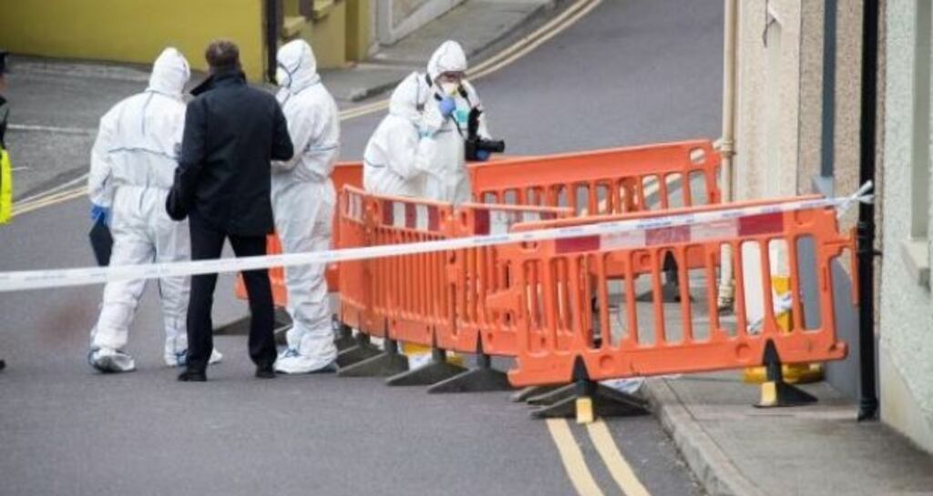 State Pathologist Marie Cassidy and Garda technical experts examine the scene in Skibbereen where John Ustic’s body was found. Photograph: Provision