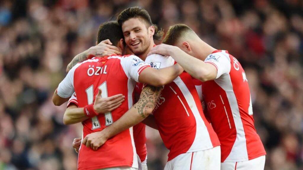 Arsenal v Everton - Arsenal’s Tomas Rosicky celebrates scoring their second goal with Olivier Giroud and Mesut Ozil. Photograph: Tony O’Brien/Reuters