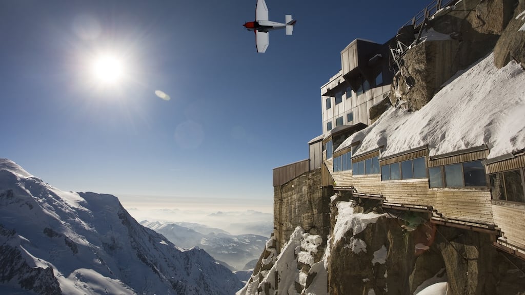 A small plane flying over the Aiguille du Midi. Photograph: Getty Images