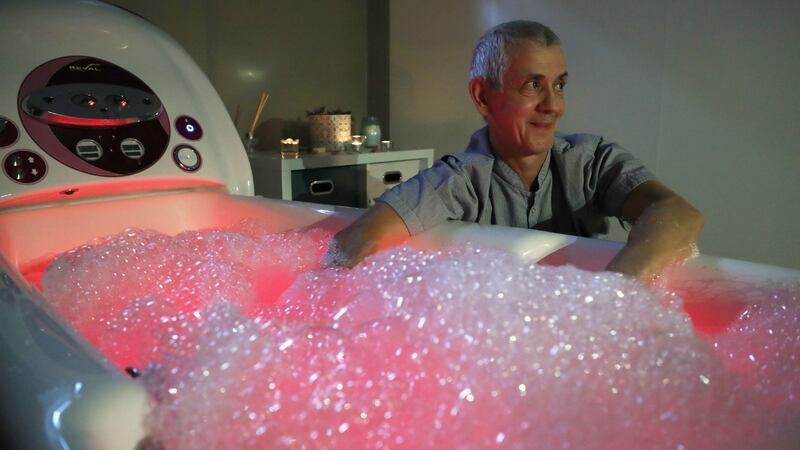 Gerard Healy getting the Jacuzzi bath ready for use. Photograph: Nick Bradshaw/The Irish Times