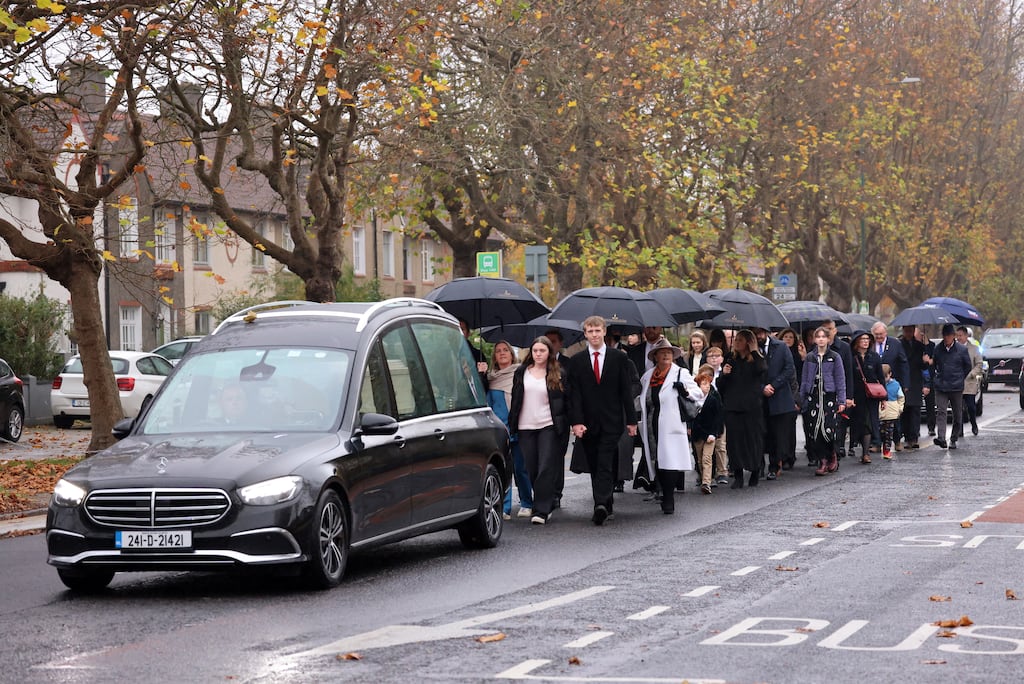 The funeral of David Davin-Power winds its way along Griffith Avenue in Dublin. Photograph: Dara Mac Dónaill / The Irish Times