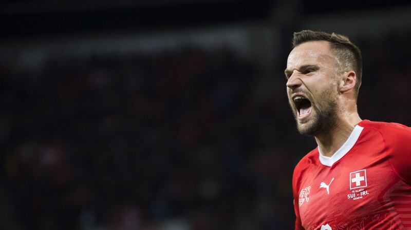 Switzerland’s Haris Seferovic celebrates after scoring the opening goal. Photograph: EPA