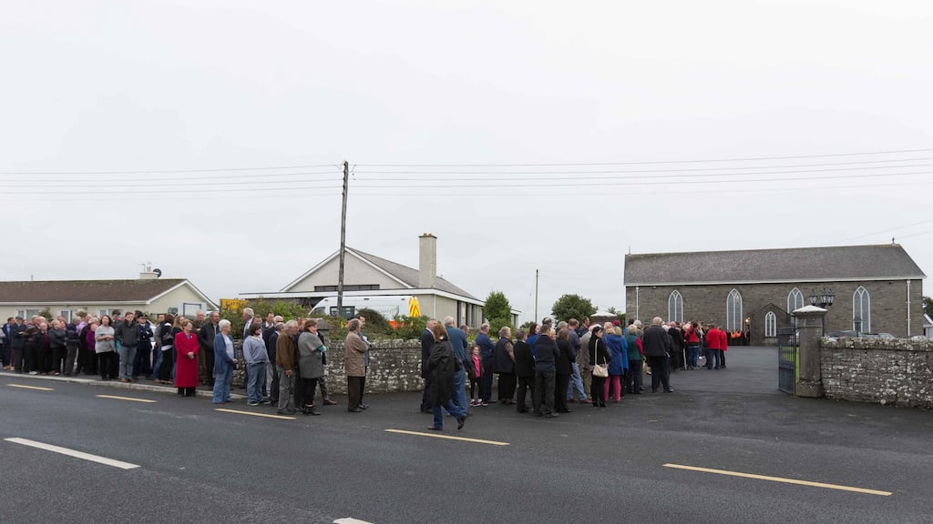 Crowds queueing to pay their respects at the removal of Caitríona Lucas at Liscannor, Co Clare, on Wednesday. Photograph: Eamon Ward
