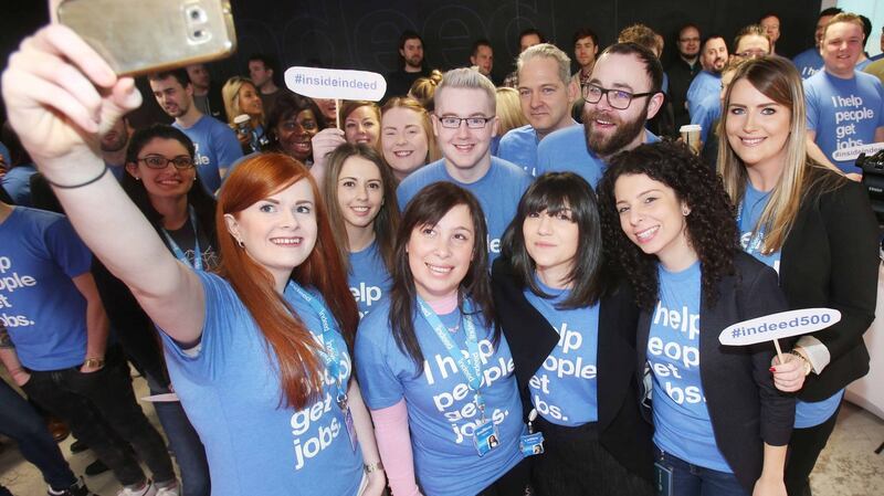 Staff take a selfie at the Indeed EMEA headquarters in Dublin after it announced plans to expand. Photograph: RollingNews.ie
