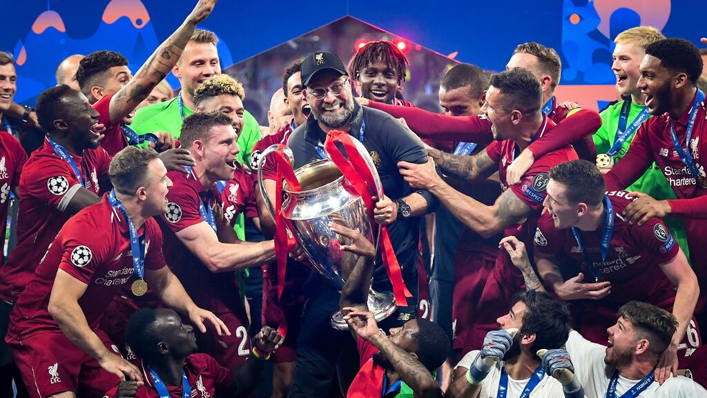 Liverpool celebrate their victory over Tottenham Hotspur in the Champions League final in Madrid. Photograph: Michael Regan/Getty Images