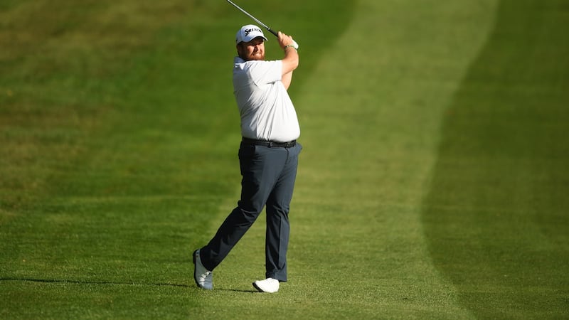 Shane Lowry  plays his second shot to the fourth hole during the first round  of the BMW PGA Championship at Wentworth Golf Club. Photograph: Harry Trump/Getty Images