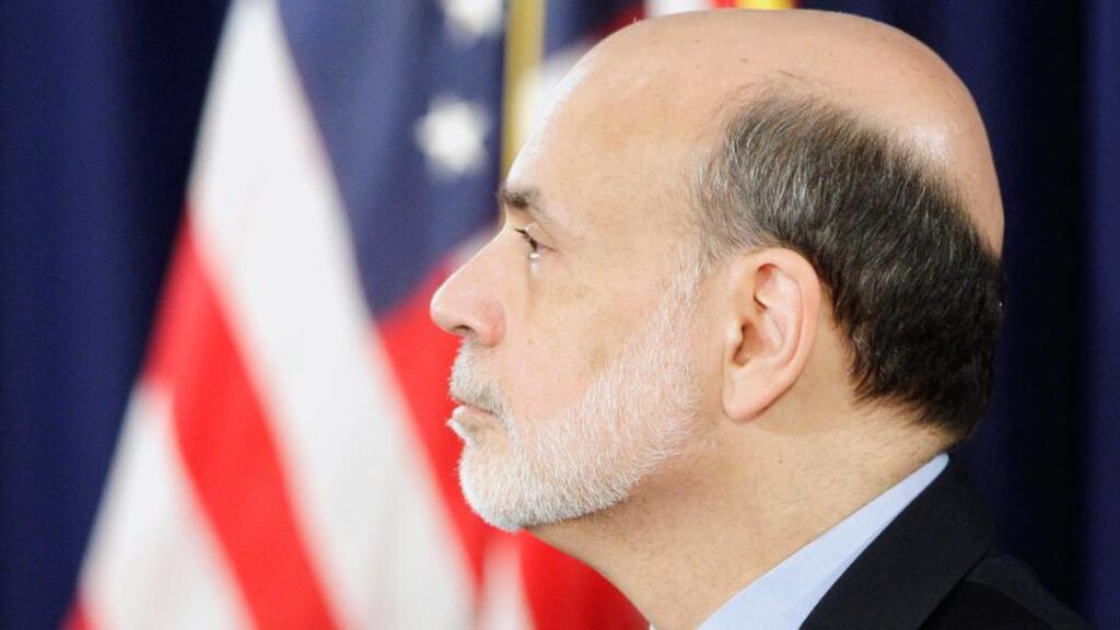 Federal Reserve Board Chairman Ben Bernanke attends a news conference at the Federal Reserve offices in Washington.