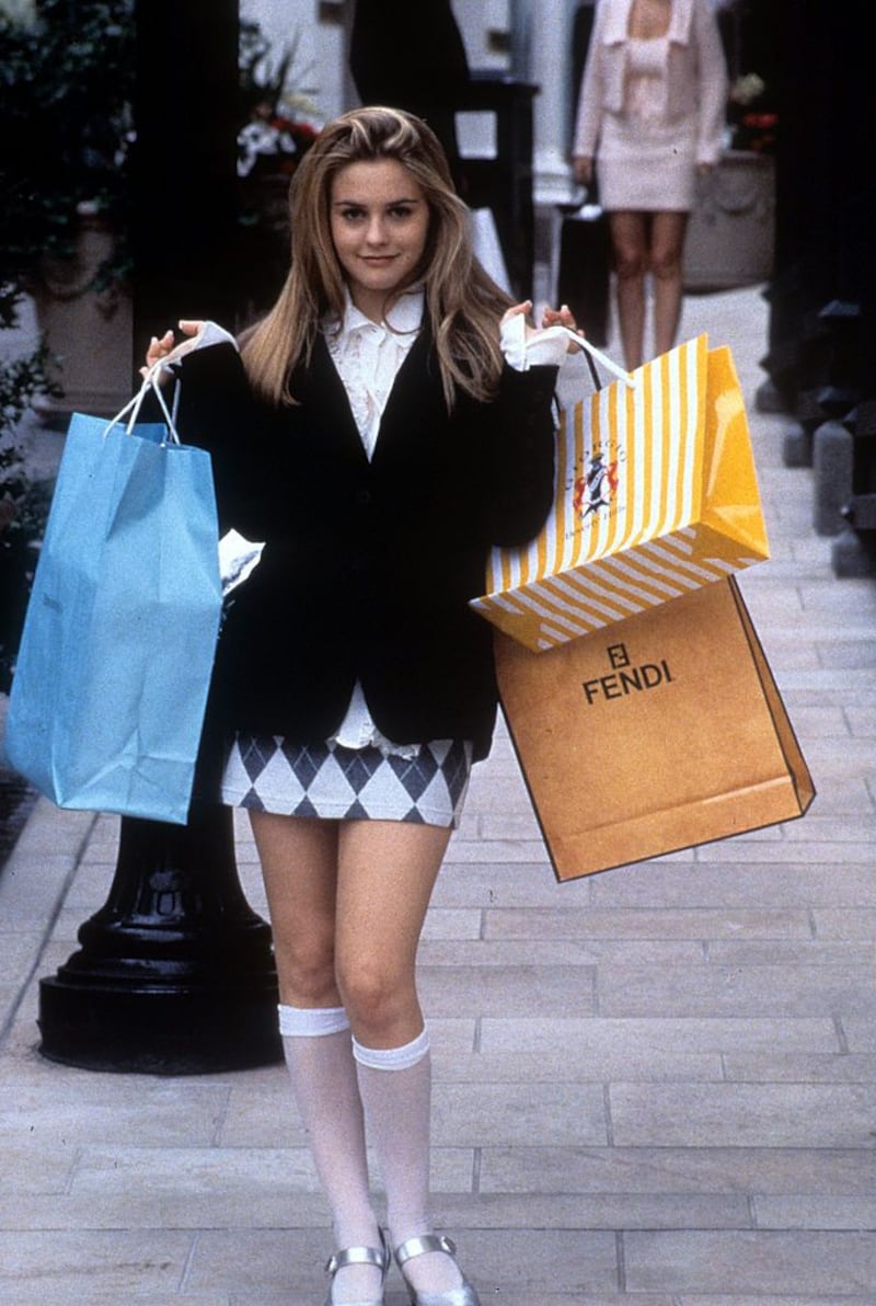 Alicia Silverstone holding shopping bags in a scene from the film Clueless in 1995. Photograph: Paramount Pictures/Getty Images