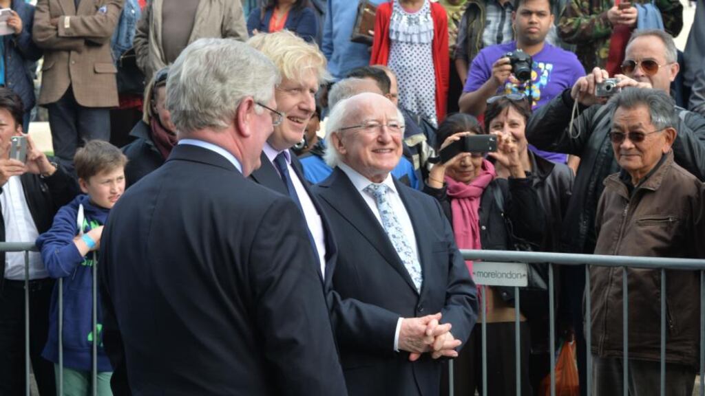 Tánaiste Eamon Gilmore , Boris Johnson, the Mayor of London greeting President Michael D. Higgins, on his arrival at a Youth Workshop at City Hall in London earlier today. Photograph: Alan Betson / The Irish Times