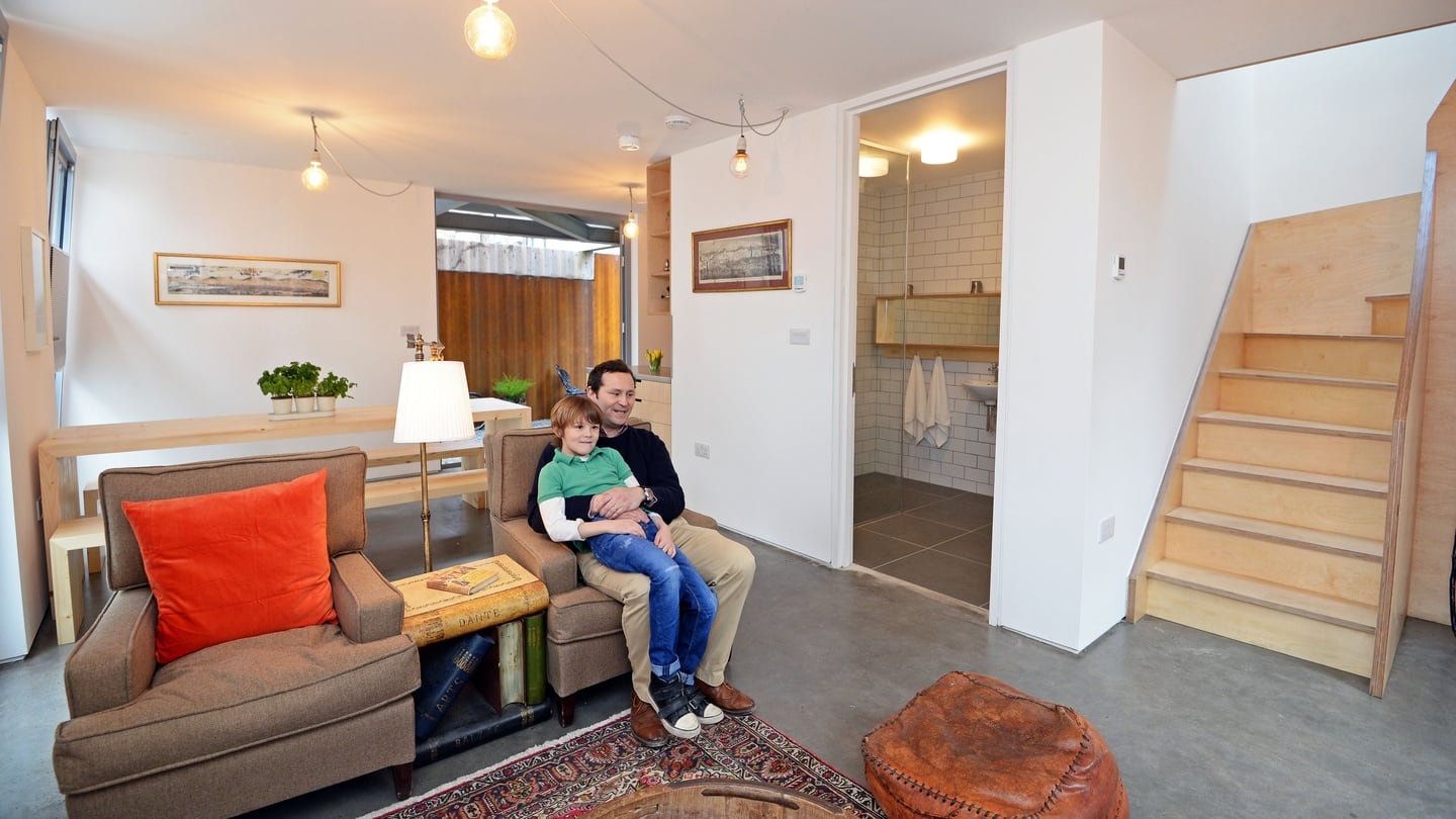 Gordie and Gordon Kelley relax in the sitting room. Photograph: Eric Luke