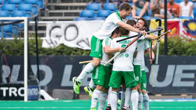 Ireland players celebrate at the final whistle after the 4-1 victory over Malaysia in the World Hockey League semi-final fifth-place play-off in Antwerp. Photograph: Grant Treeby/Inpho