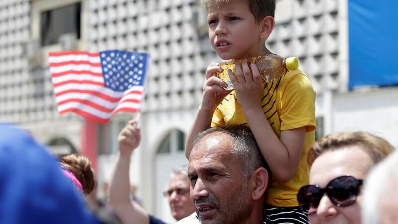 A boy looks on during the 20th anniversary of the deployment of Nato Troops in Kosovo, in Pristina on Thursday. Photograph: Florion Goga/Reuters
